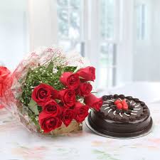 1 Kg Theobroma Dutch Truffle Cake with 20 red roses bouquet
