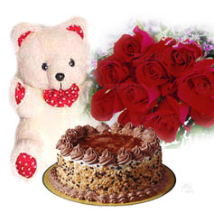 1/2 kg Cake with 12 red roses and teddy bear