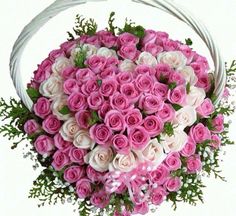 70 pink roses with white heart in centre
