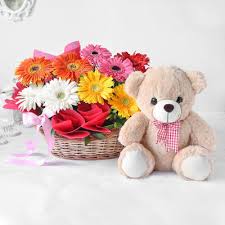 20 gerberas with teddy 6 inches in basket