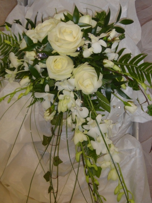 Orchids and roses arrangement