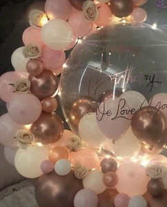 Happy Birthday love Printed balloon with 30 Gold and Pink balloons decorated with white flowers and lights