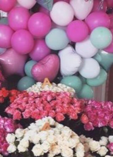 25 blue and pink gas pre filled balloons with 2 Bouquets of 10 white roses each and 2 Bouquets of 10 pink roses each