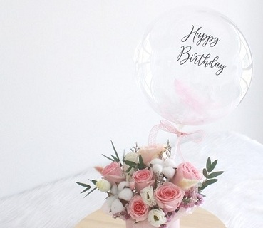 Transparent Balloon Printed Happy Birthday with basket of 15 white pink roses and greens