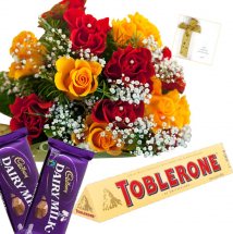 6 Red 6 Yellow Roses bouquet with 2 Dairy Milk and 1 Toblerone chocolate