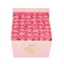 50 pink color roses in a pink box