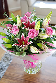 2 Pink Lilies and 6 roses bouquet