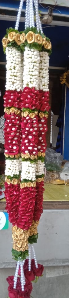 2 garlands with red white flowers gold leaves and beads