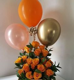 20 Orange roses basket with 1 gold 1 orange 1 pink balloons