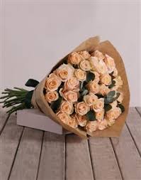 60 pretty peach roses hand bouquet