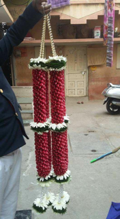 2 bride and groom garlands