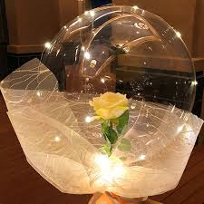 1 Luminous LED Balloons with 1 yellow rose inside transparent balloon with white Wrapping