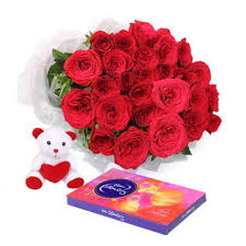 Cadburys celebration with 18 red roses and Teddy 6 Inches