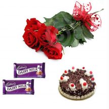 2 Dairy Milk chocolates 4 Red Roses 1/2 Kg Black forest Cake