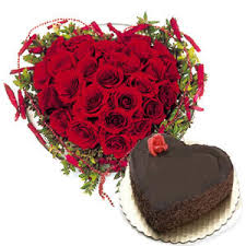 A heart Arrangement of 20 red roses and 1 kg heart dutch truffle chocolate cake