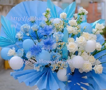 30 Blue (sprayed with colour) and White Rose basket with Blue paper fans and a few blue white balloons