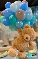 20 Gas filled Blue Balloons tied to 12 Inches brown Teddy bears hand