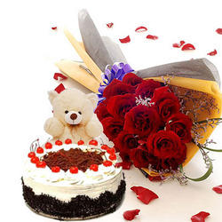 6 inch Teddy 1/2 Kg black forest cake 12 red rose